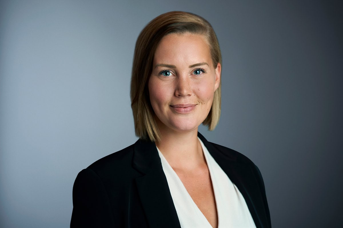 Female employee at the Circus Building, who is ready to help you with your event